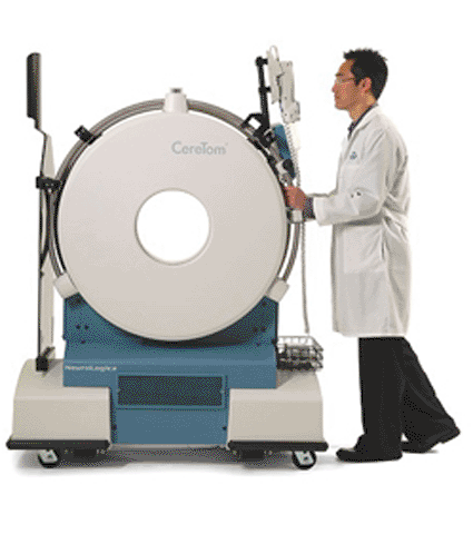 Image: The CereTom portable CT with a technologist (Photo courtesy of NeuroLogica).